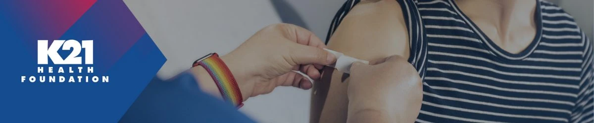 person putting bandage on