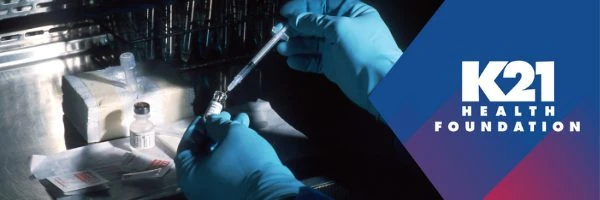 doctor in lab working on vaccines