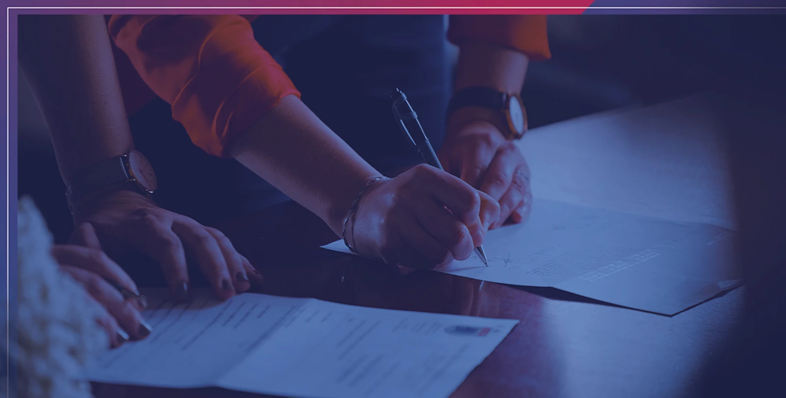 person writing on paper