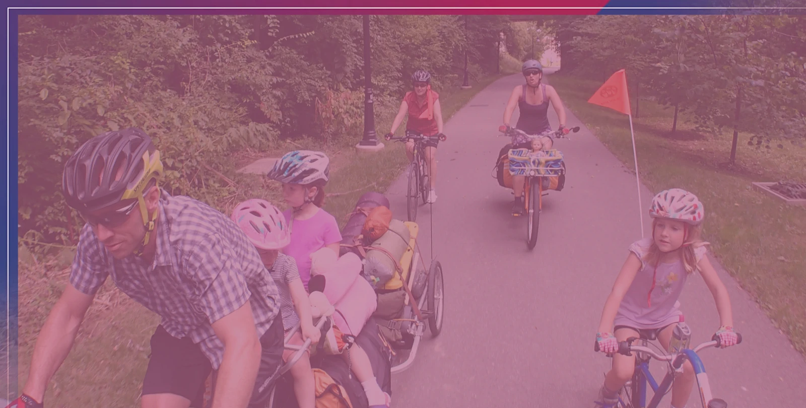 family biking on trail