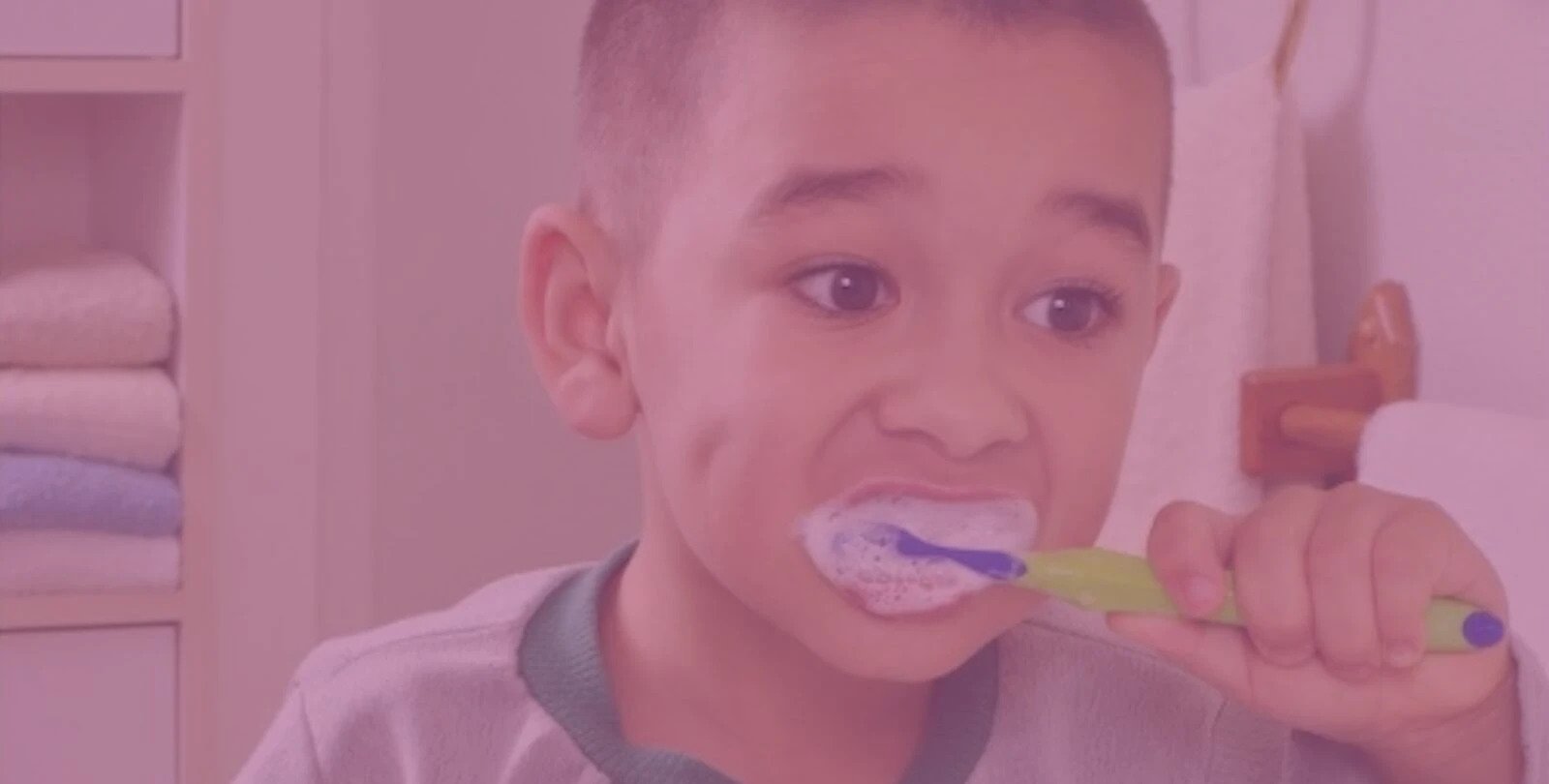 child brushing teeth