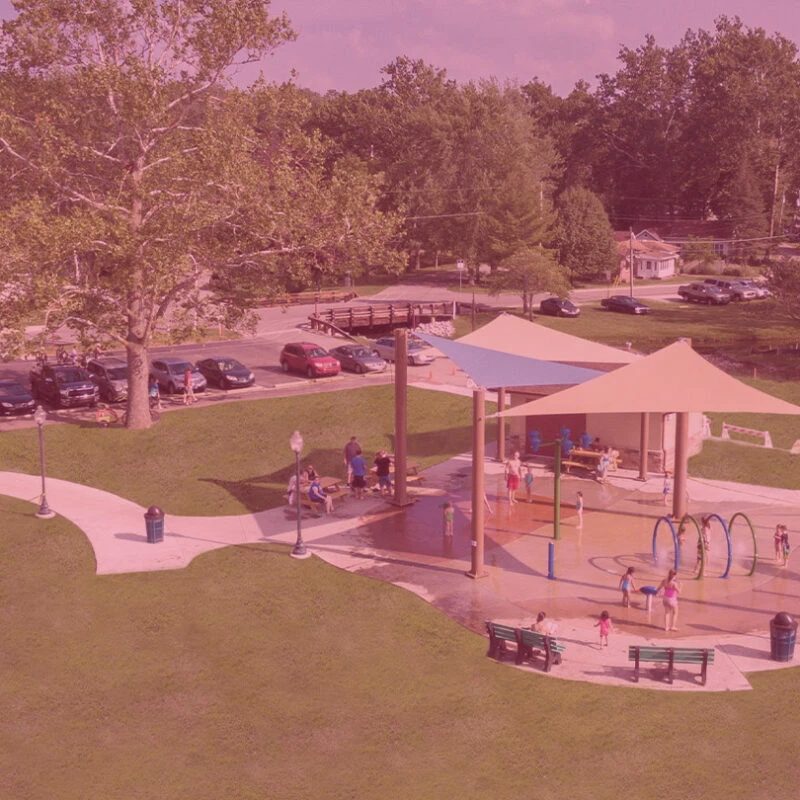 Aerial view of Limitless Park Splash Pad with children playing