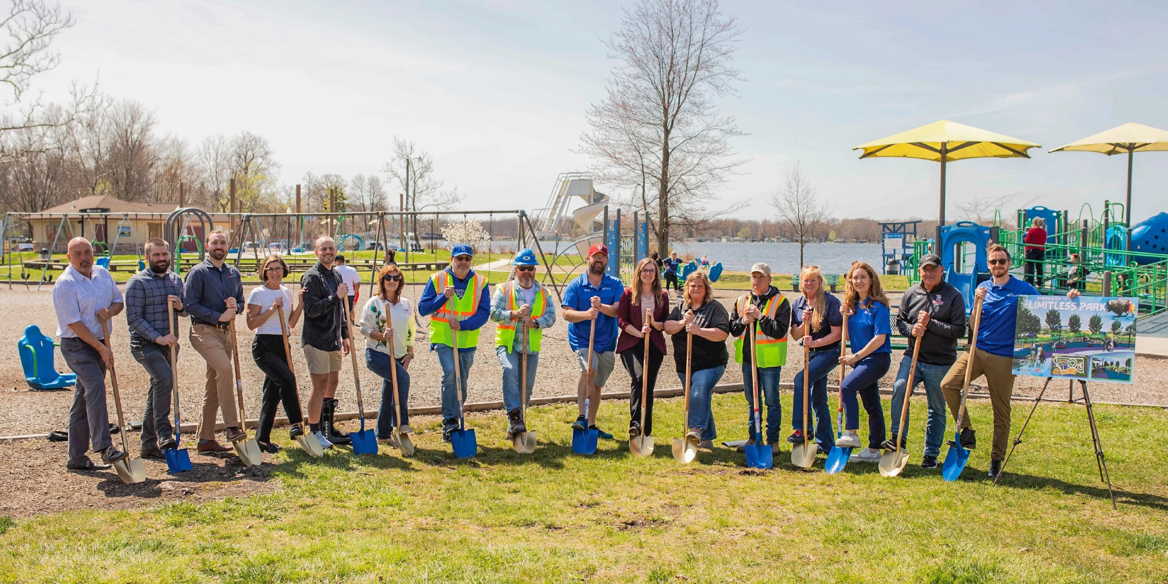 Group of people holding shovels at Limitless Park groundbreaking event