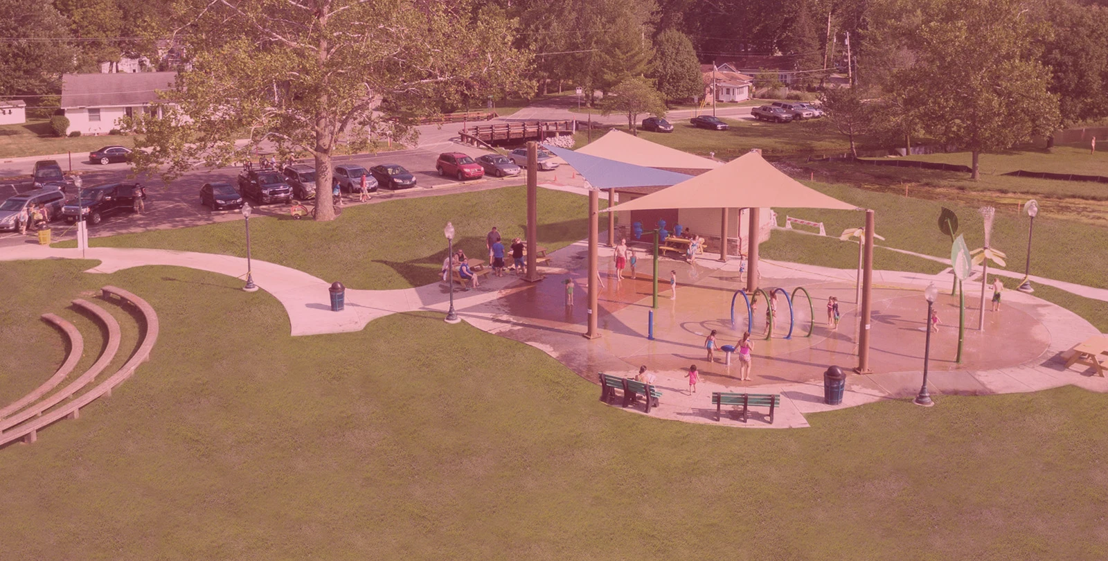 Aerial view of Limitless Park Splash Pad with children playing